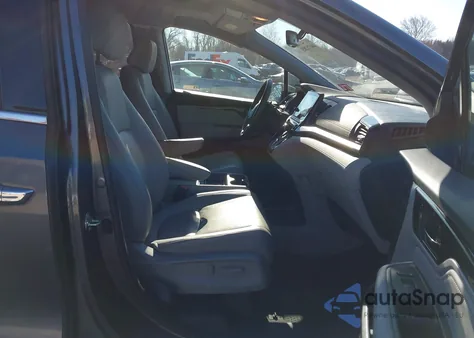 2019 Honda Odyssey Elite z USA, uszkodzony, nr VIN 5FNRL6H94KB102720